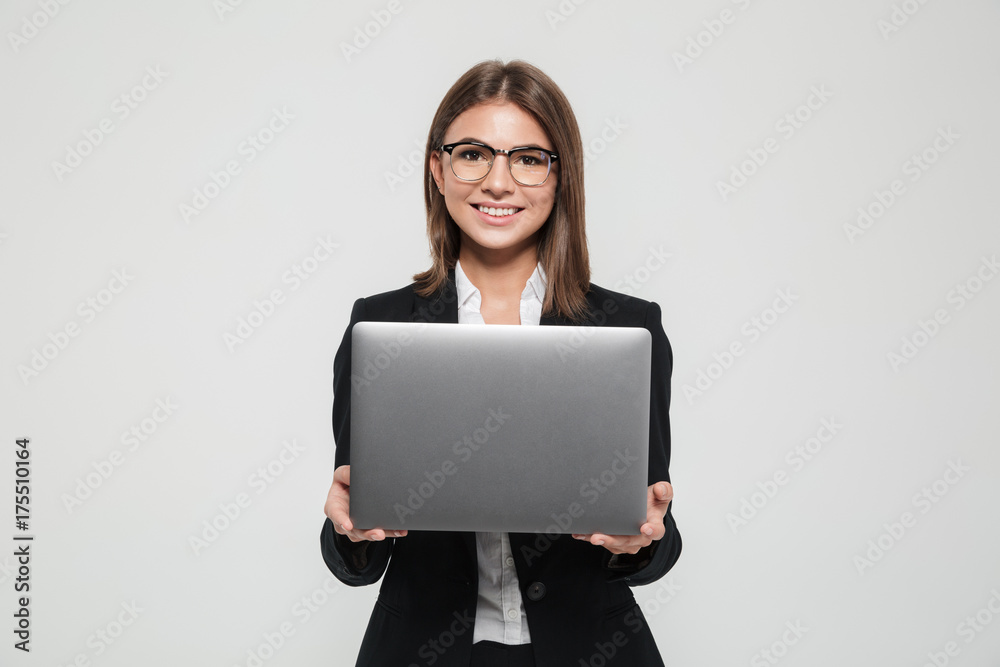 Portrait of a young attractive businesswoman in suit Portrait of a young attractive businesswoman in suit