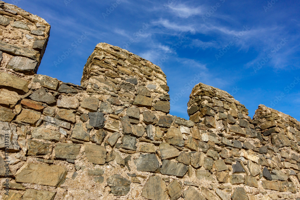 castle walls against blue sky