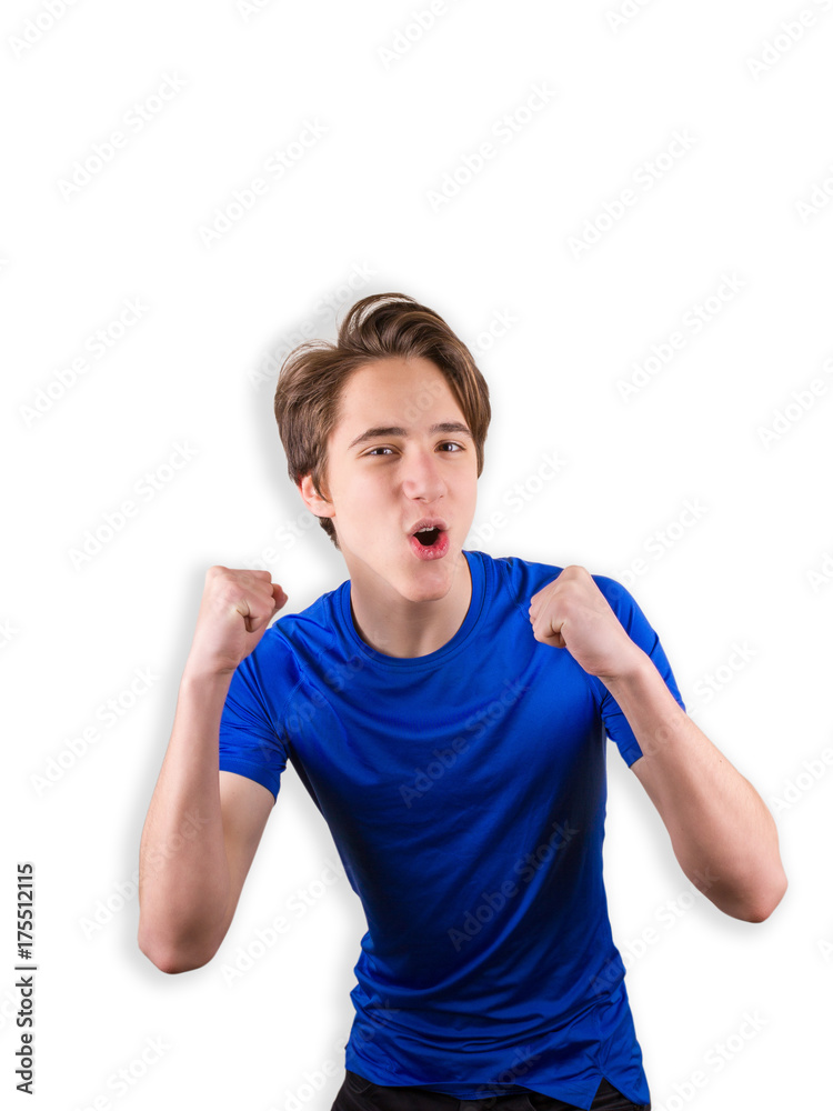 Handsome teen boy looking at camera. Portrait of teenager, sport, workout concept. Happy guy smiling and celebrating the win, white background Handsome teen boy looking at camera. Portrait of teenager, sport, workout concept. Happy guy smiling and celebrating the win, white background