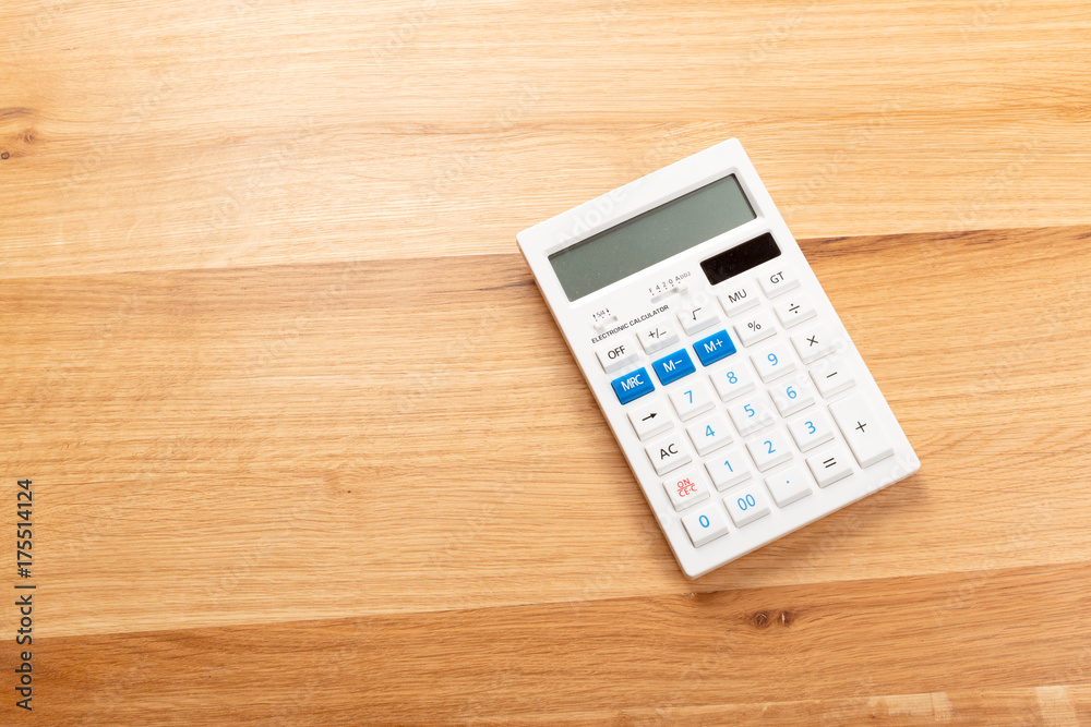 calculator on desk calculator on desk