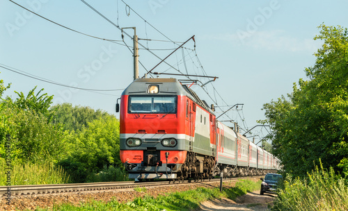 Photography Electric locomotive with a passenger train in Russia