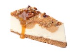 Slice of pecan caramel cheesecake isolated on a white background