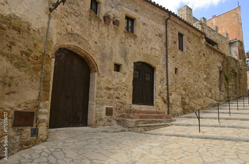 Stairs in stone street  in Pals, Girona, Spain © monysasi
