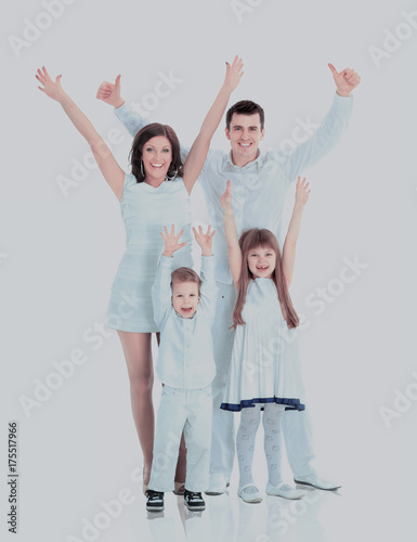Happy family smiling. Isolated over a white background