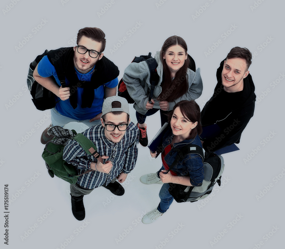 Top view. Happy smiling young group looking at camera. Top view. Happy smiling young group looking at camera.
