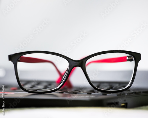 Glasses, laptop
