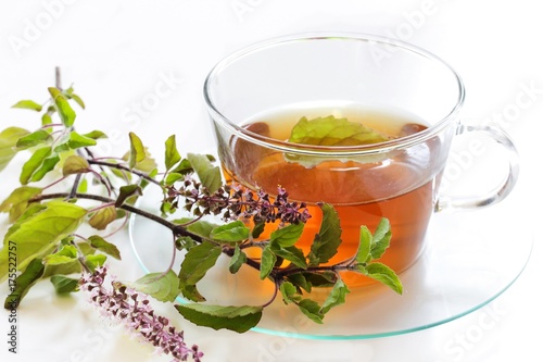 Tulsi Tea isolated on white, selective focus
