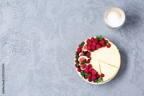 Cheesecake with raspberries and figs on a gray background, raspberry, berries, cake, horizontal, soft focus, sweets
