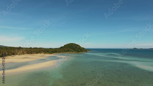 Beautiful river landscape view from above without people, only nature - aerial. A sandy shallow beach, a wave movement and an island with green trees. Sea, waves, vacation. photo