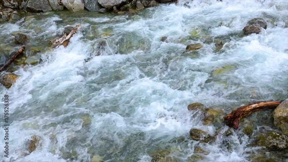 Mountain river water with slow motion closeup Mountain river water with slow motion closeup