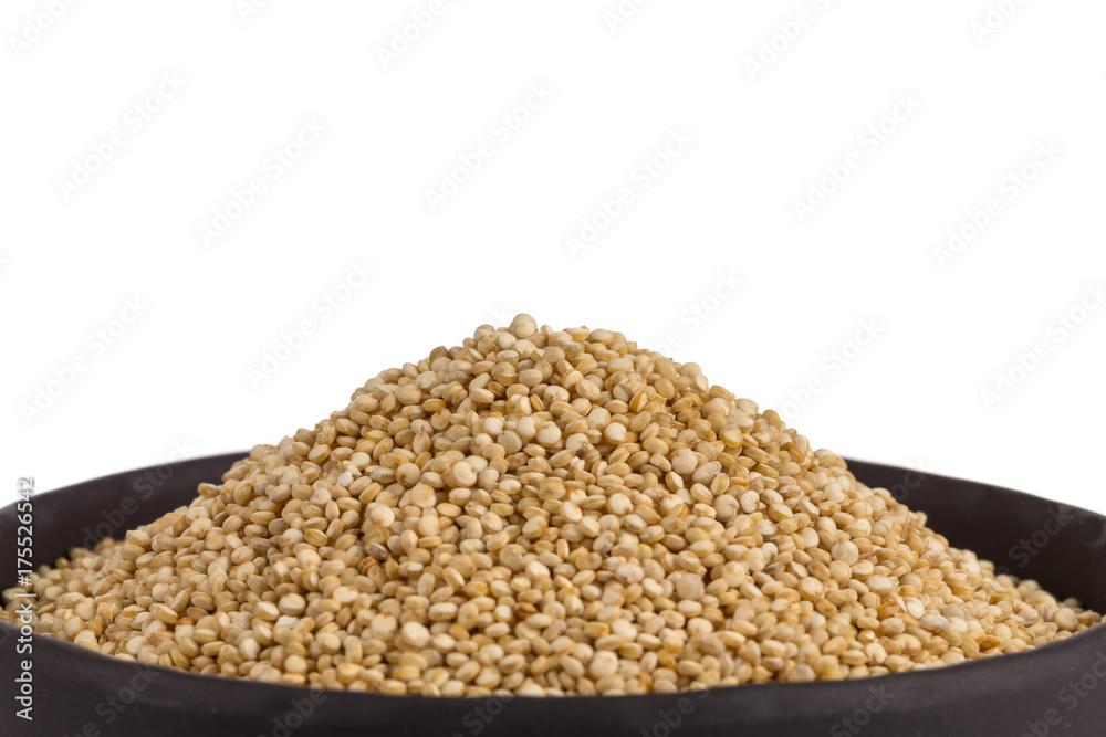 Pile of grain quinoa seeds in bowl Pile of grain quinoa seeds in bowl