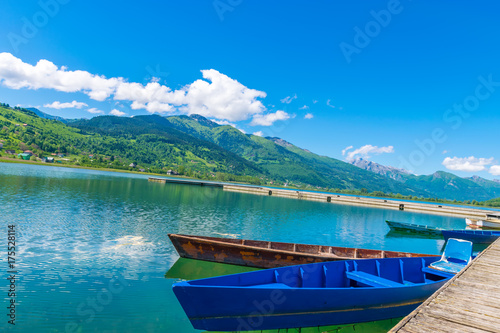 A large pacifying mountain lake in a picturesque valley.