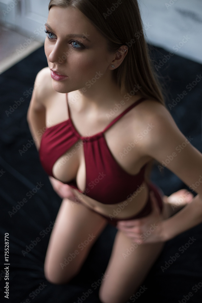 beautiful young girl with long hair in a sexy swimsuit beautiful young girl with long hair in a sexy swimsuit