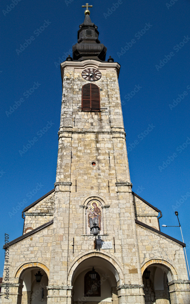 Clock tower on church in Sremska Kamenica, Serbia