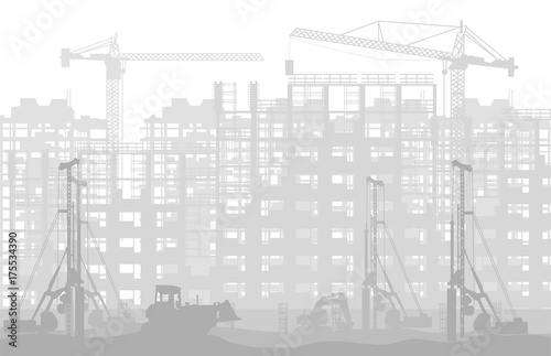 construction of multi-storey residential building early misty morning