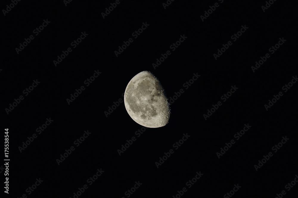 Moon on a dark background with a terminator and a shadow Moon on a dark background with a terminator and a shadow
