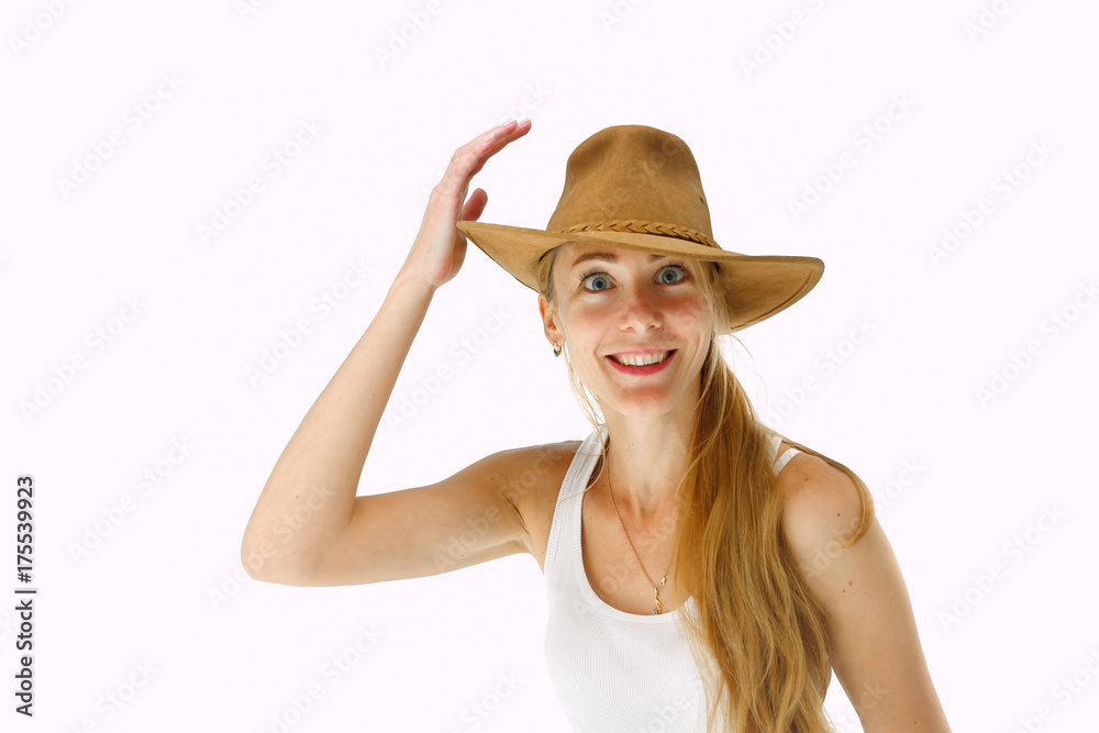 Close up portrait of smiling young woman with cowboy hat Close up portrait of smiling young woman with cowboy hat