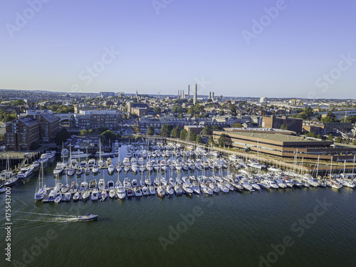 Pier of Boston Massachusetts USA, Wharf with sailboat and yachts in Charles Rive, skyline skyscrapers