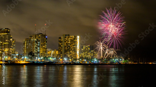 Viewing colorful fireworks from Magic Island, Honolulu, Hawaii