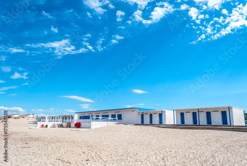 White and blue building on the beach