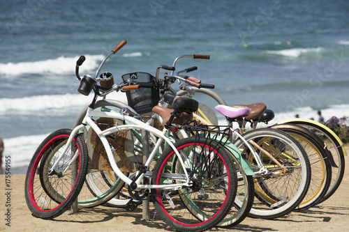 A group of two wheeled bicycles at the coast of Del Mar, San Diego, California.