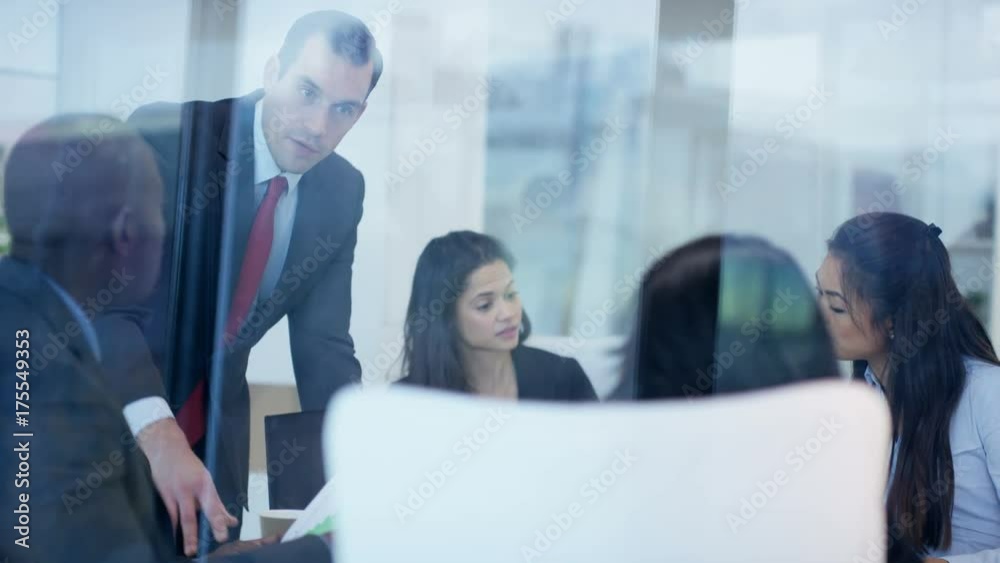  Corporate business management team in boardroom meeting in city office