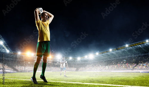Soccer player at field. Mixed media © Sergey Nivens