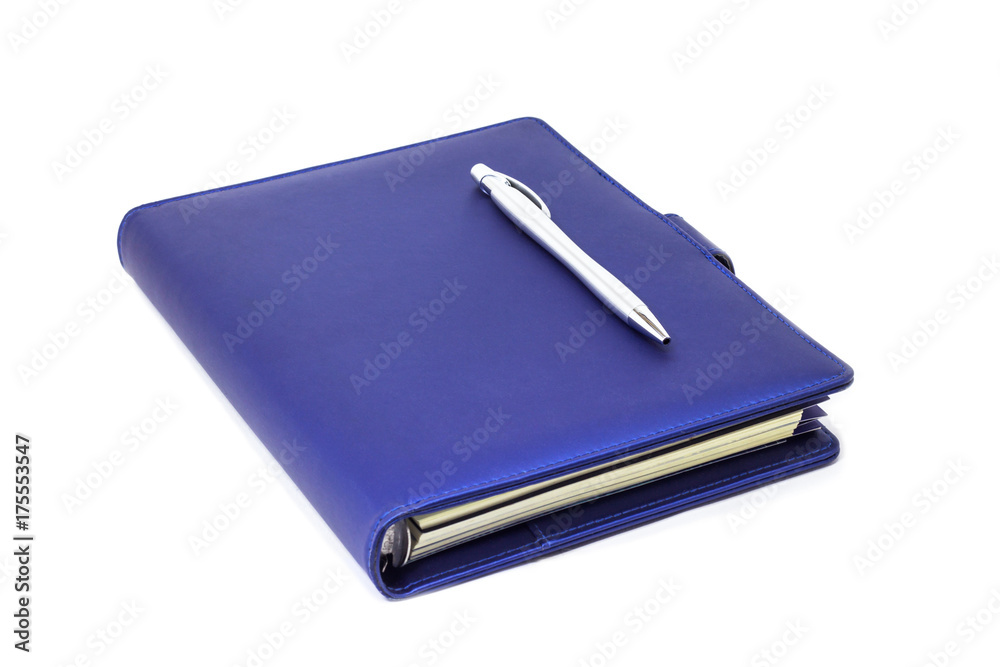 blue diary and pen isolated on and white background blue diary and pen isolated on and white background