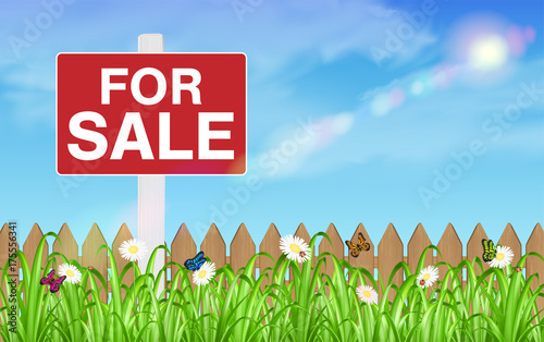 land for sale sign board with wooden fence grass