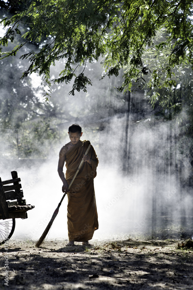 Buddhist Monk Sweeping