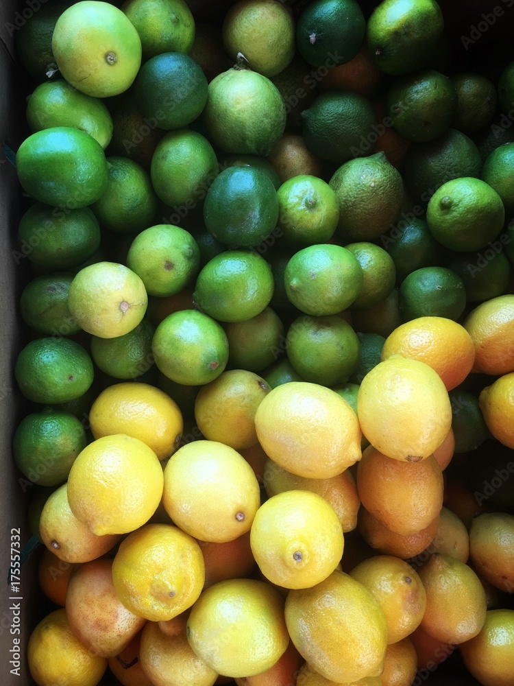 Lemon limes in a gradient pattern in a pile