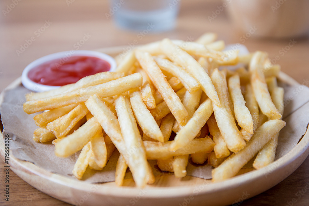 Fresh Potatoes Tasty french fries with ketchup fast food products Fresh Potatoes Tasty french fries with ketchup fast food products