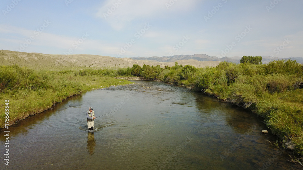 Aerial view of fly fisherman fishing in Montana river