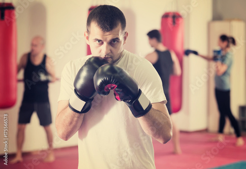 sportsman   training in  boxing gloves © JackF