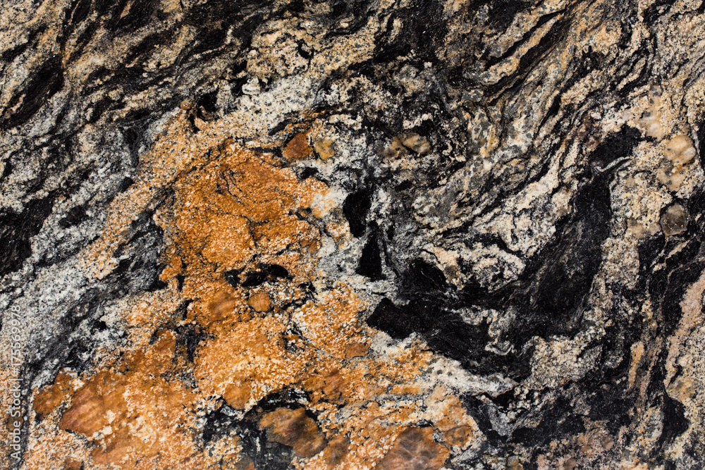 Close up of granite texture, black and brown color, precious stone. Close up of granite texture, black and brown color, precious stone.