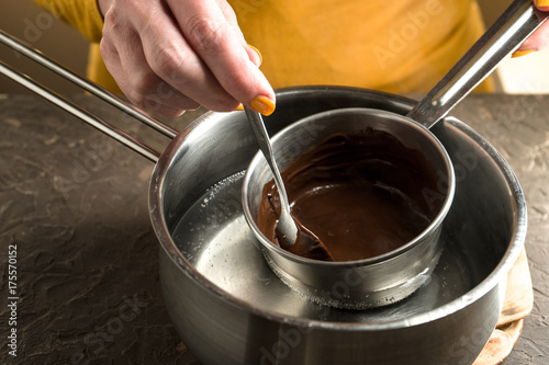 Preparation of hot chocolate for pumpkin pie in a saucepan