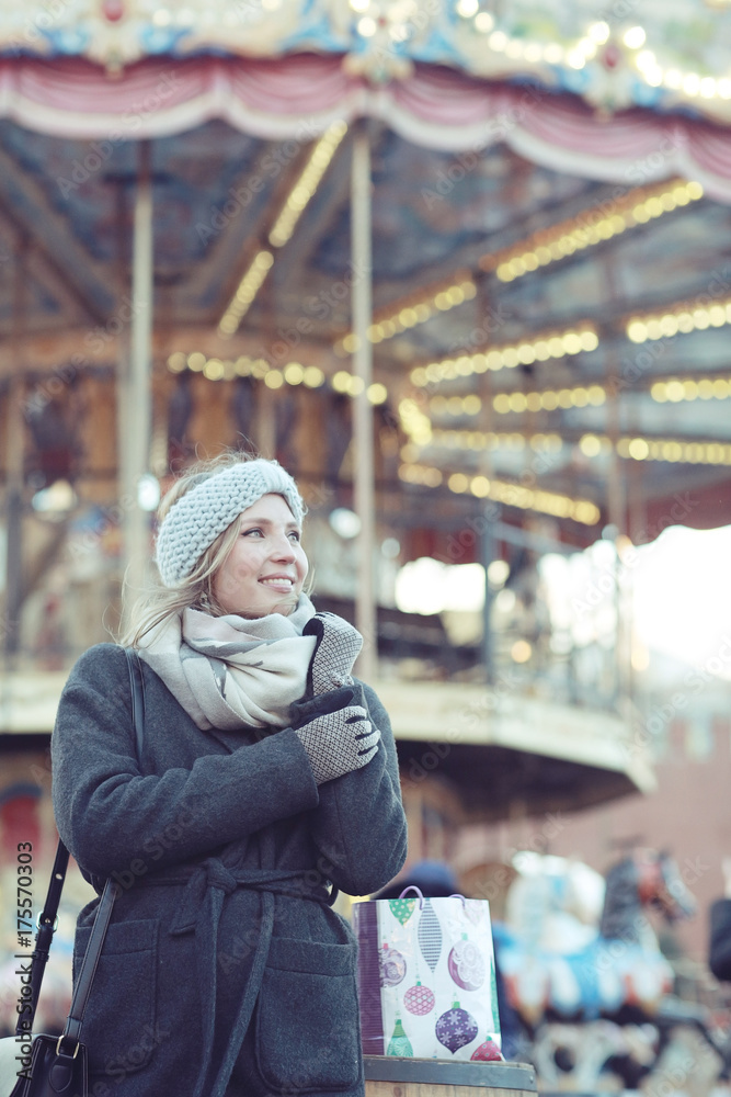 happy woman buys gifts for the new year