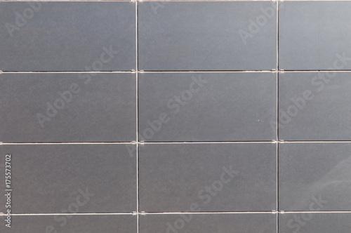 wall of grey ceramic tiles