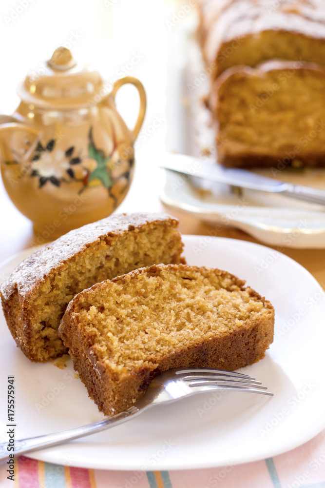 sweet almond homemade cake on white plate with coffee sweet almond homemade cake on white plate with coffee