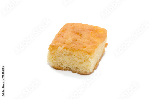 a piece of chiffon cake on white background
