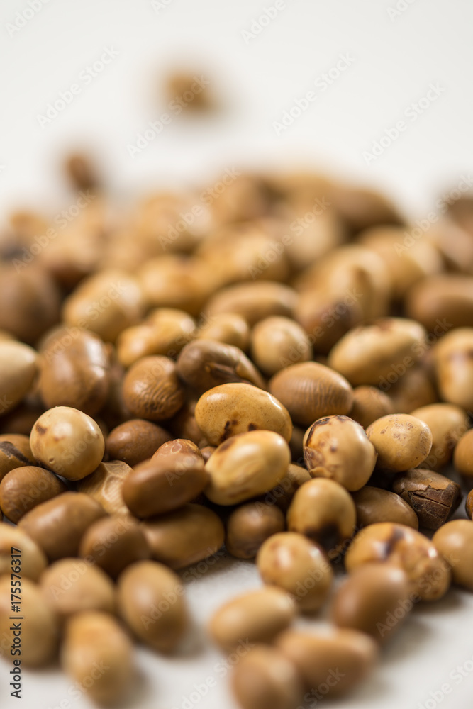 Selective focus on soya beans on the white marble background table Selective focus on soya beans on the white marble background table