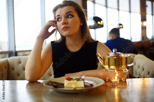 young adult girl in cafe