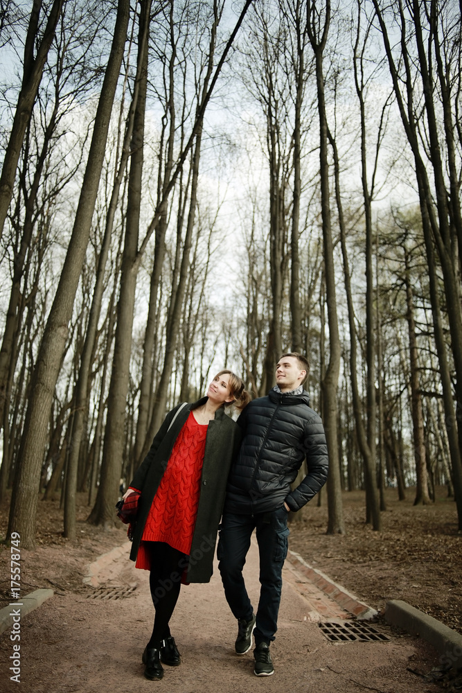 lovers resting in a city park in the winter lovers resting in a city park in the winter