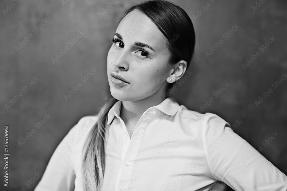Portrait of a pensive young adult beautiful girl