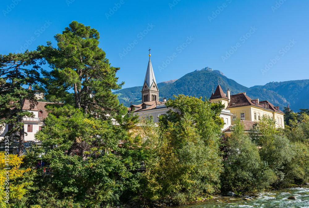 Merano in South Tyrol, a beautiful city of Trentino Alto Adige, View on the famous promenade along the Passirio river. Italy. Merano in South Tyrol, a beautiful city of Trentino Alto Adige, View on the famous promenade along the Passirio river. Italy.