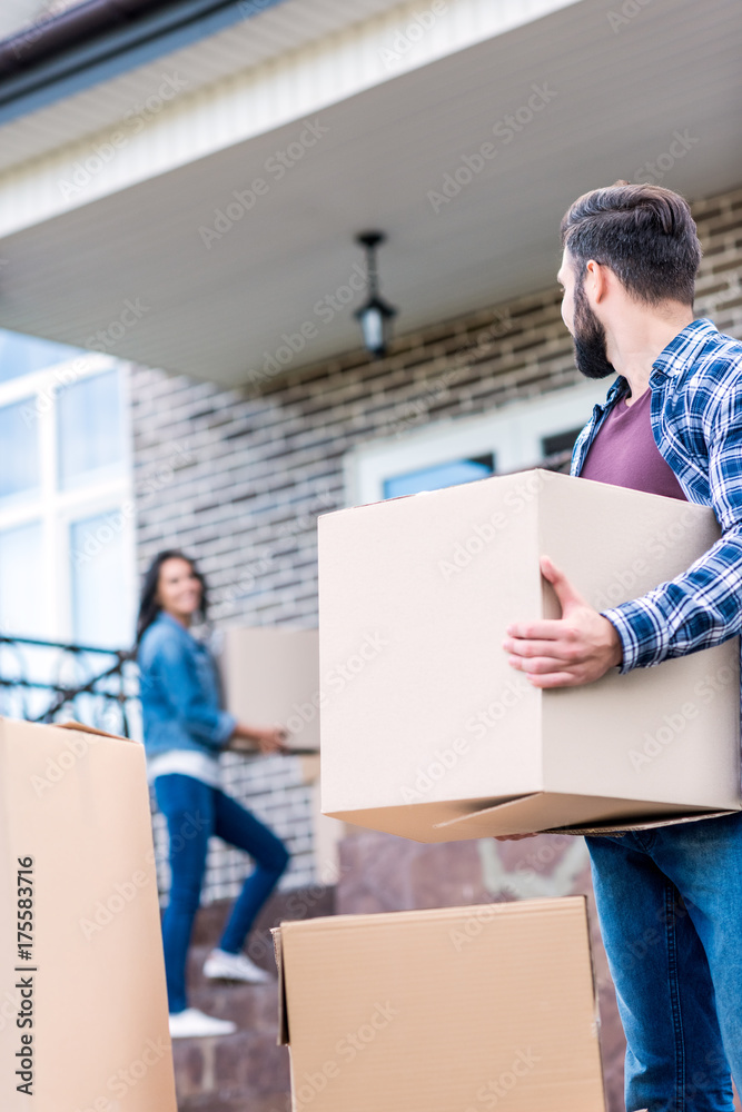 couple moving into new house couple moving into new house