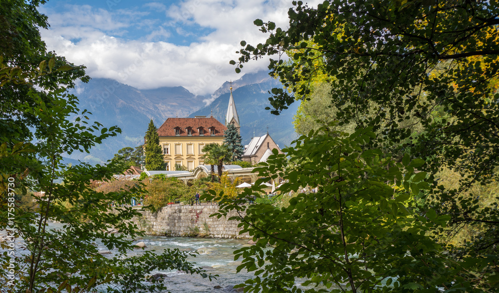 Merano in South Tyrol, a beautiful city of Trentino Alto Adige, View on the famous promenade along the Passirio river. Italy.