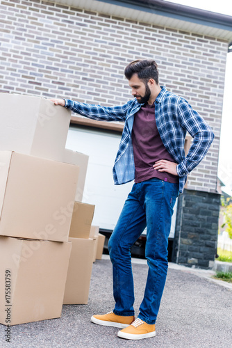 man moving into new house