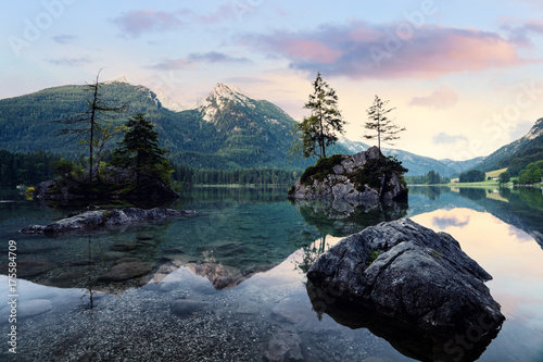 Hintersee alpine mountain lake and clousy colorful sunrise photo