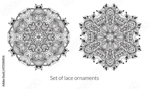 Set of lace ornaments for your design on a white background. Vector round patterns with many details. Black and white collection.